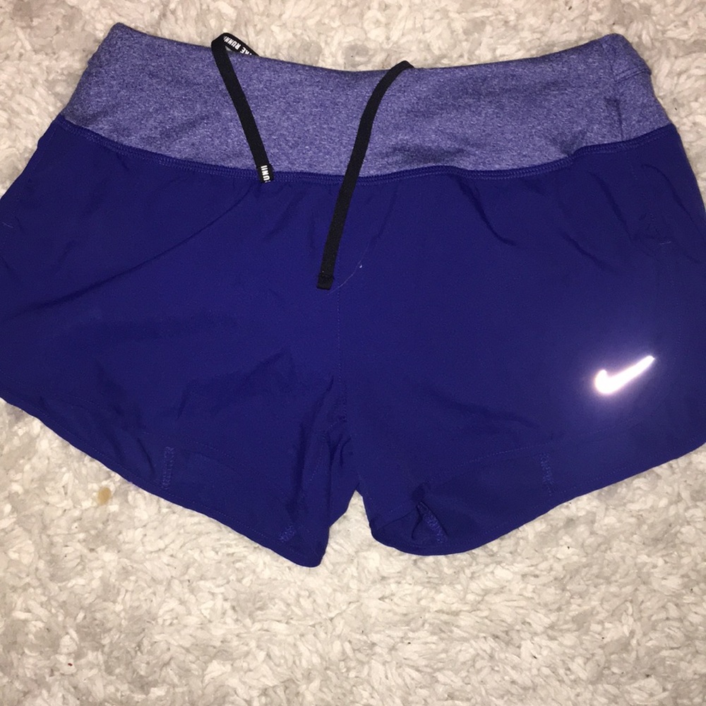 Purple Nike shorts